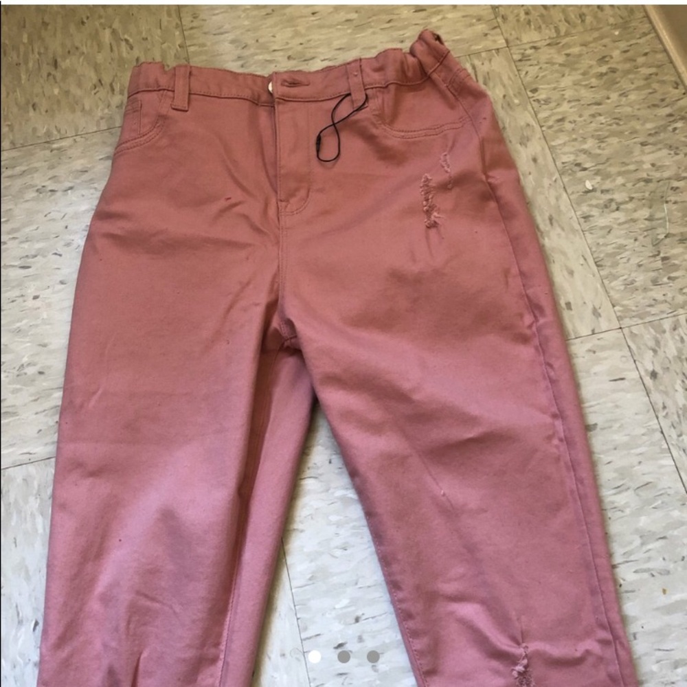 Rose gold pair of skinny jeans